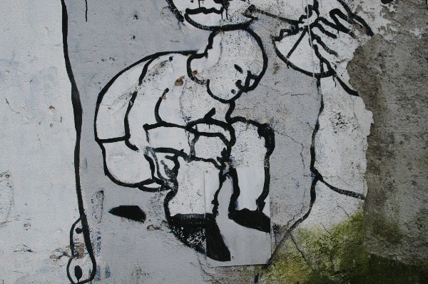 Omino piegato :: Murales