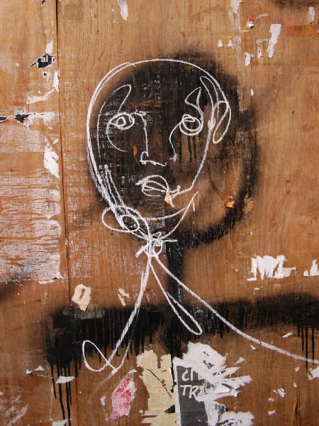 Viso sul legno :: Murales